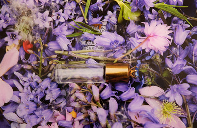 perfume bottle & flowers