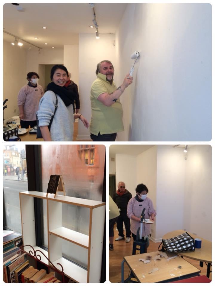 Volunteers painting the gallery