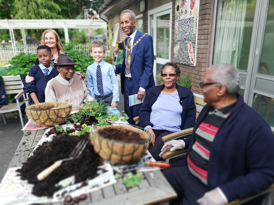 Intergenerational planting at Michael Flanders Resource Centre