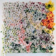 A Monument to Summer, 2024. 100% waste: discarded Actimel bottles, leftover buttons, bits, bobs, fruit nets, ringpulls, old business cards and a whole lot of stitching, crocheting and loving on a few layers, 100x100cm.